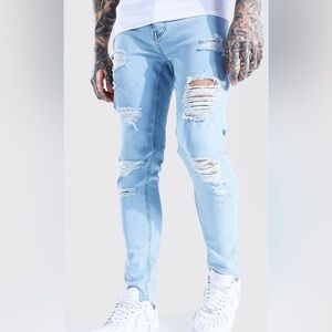 Skinny stretch light blue jean with rips
